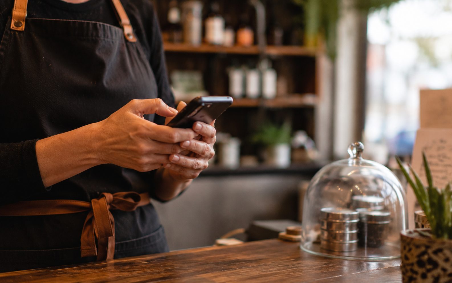 Vernon business owner texting a customer a Google review link from their phone