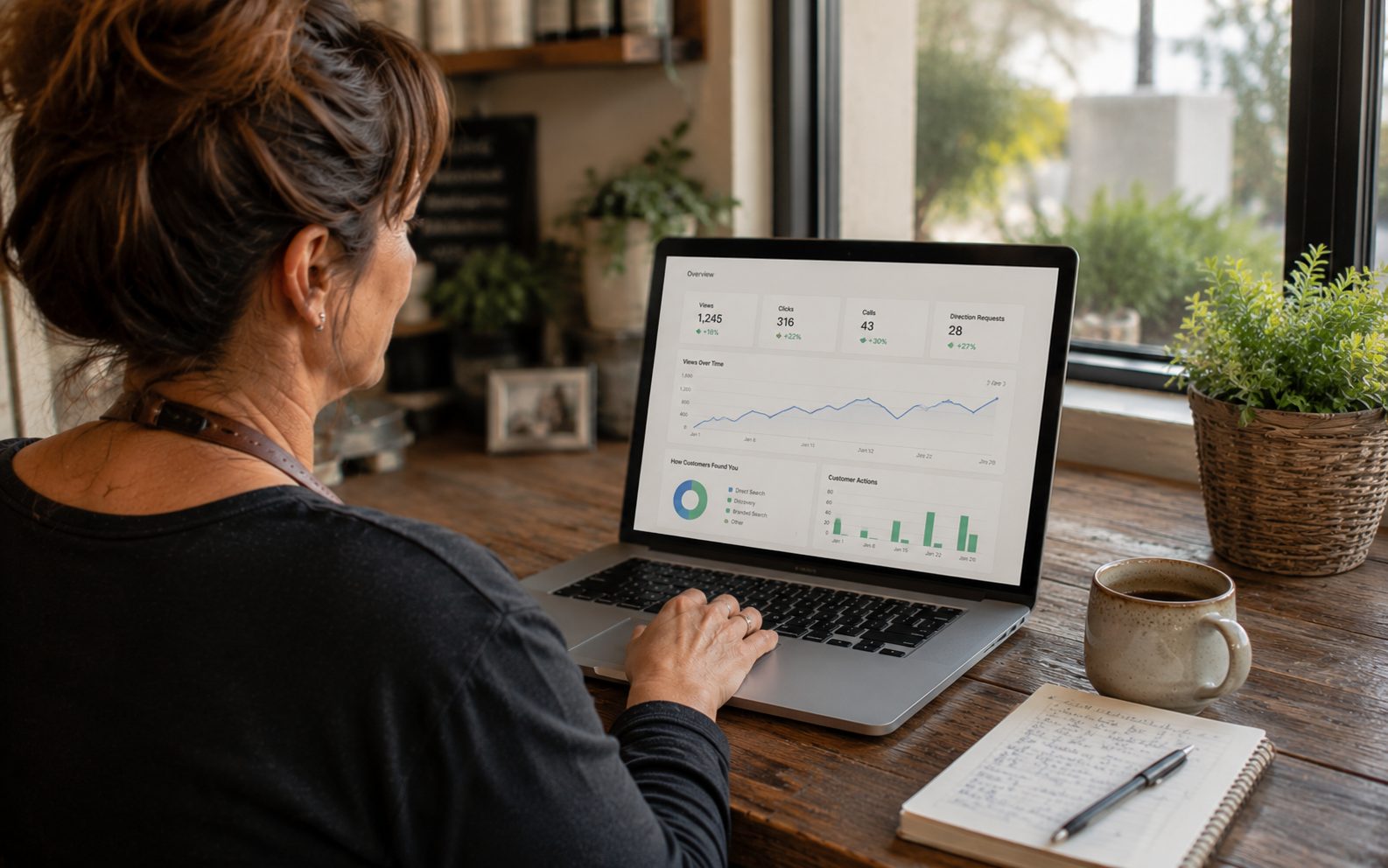 Vernon business owner tracking local SEO results on an analytics dashboard at a laptop